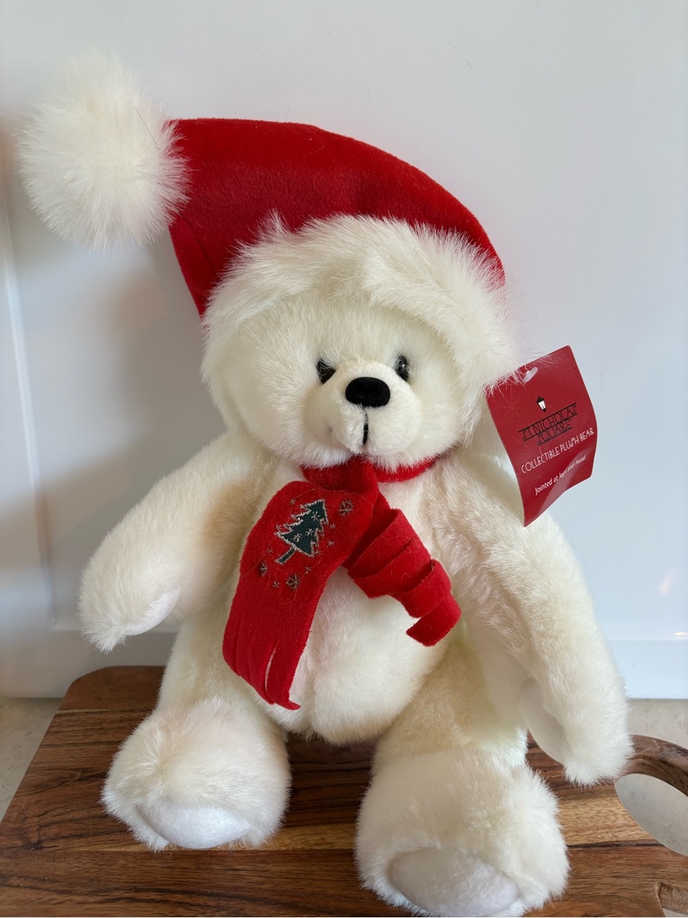 St. Nicholas Square collectible bear plush, measuring approximately 11 inches.